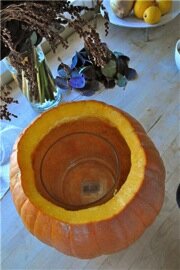 Glass vase inside pumpkin